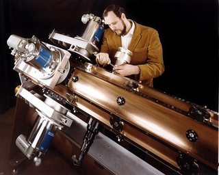 Technician Adjusting a Radio Frequency Quadrupole (RFQ)